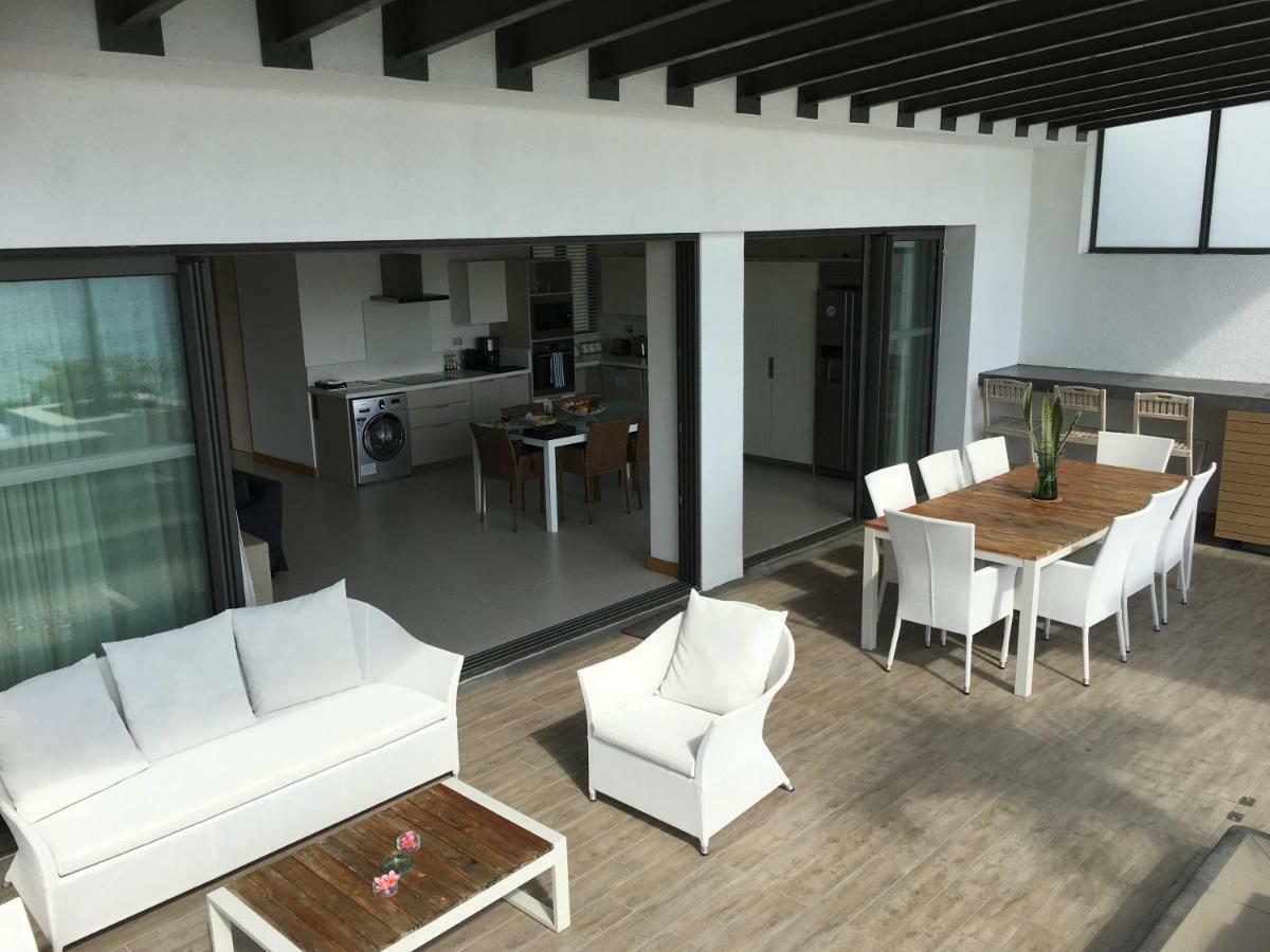 Cap Ouest Beachfront Luxury Penthouse & Apartment Flic en Flac Bagian luar foto